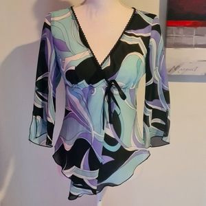 A.Byer Long Sleeve Multi colored translucent blouse. Size M